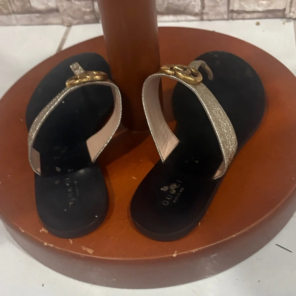 Gucci Black Footbed Sandals with Gold Metallic Straps